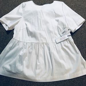 The mullet of peplum tops! New with tag!